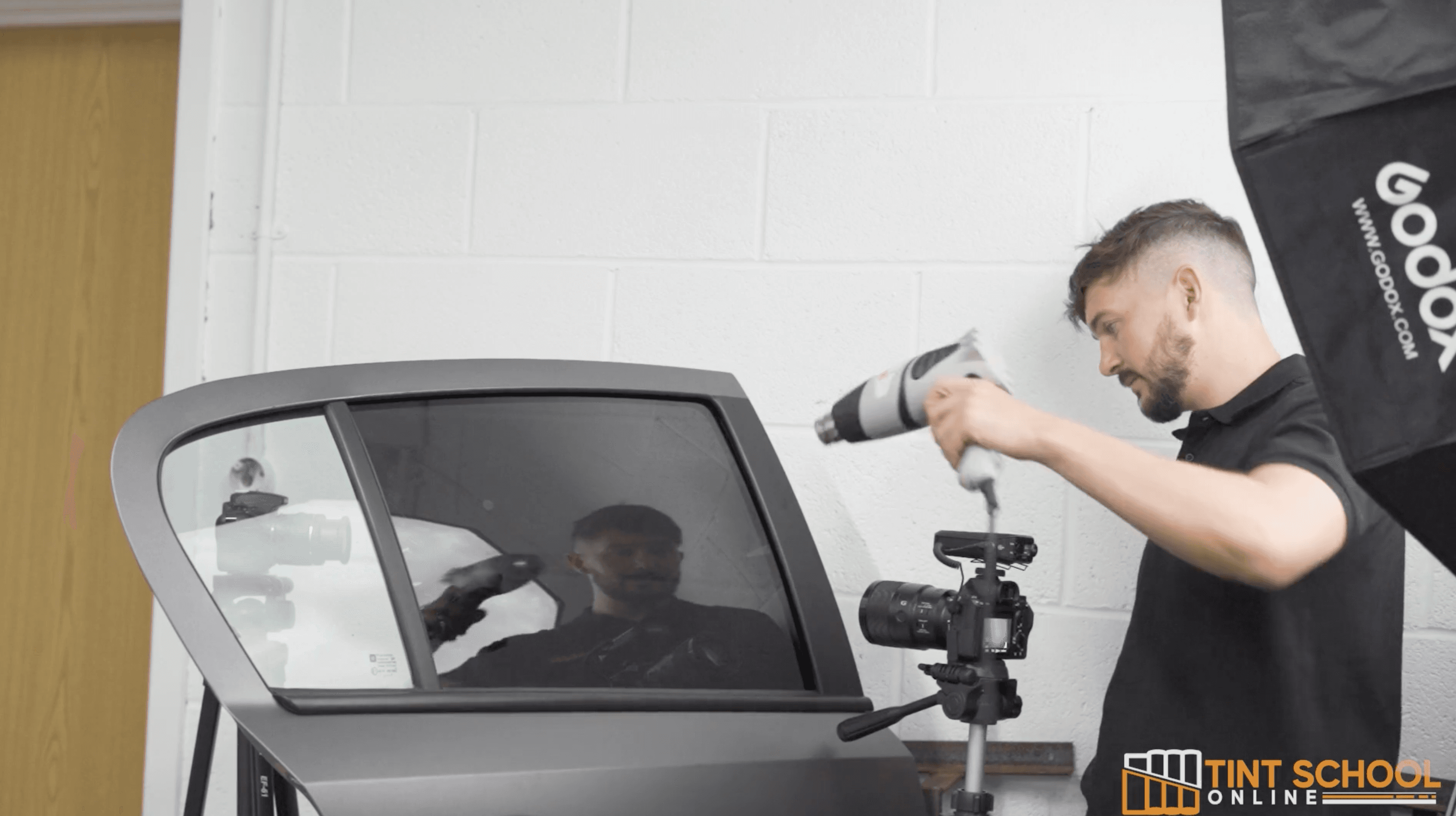 Tint School Online — Professional camera rig, Godox studio lighting, and heat gun technique